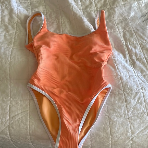 lainsnow Other - Brand new with liner lainsnow one piece in cantaloupe.